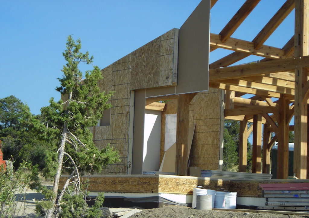 enclosing timber frame with sips